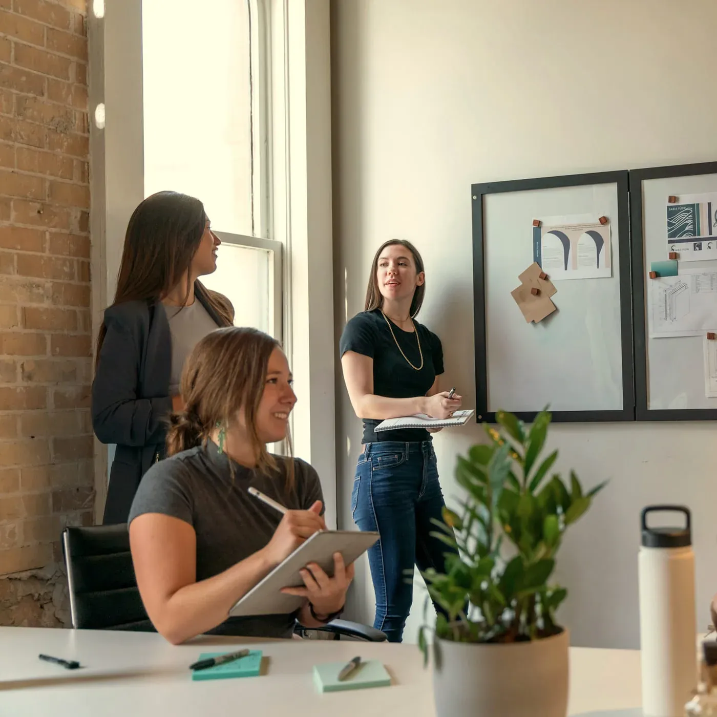 The Magnifito team discussing a project